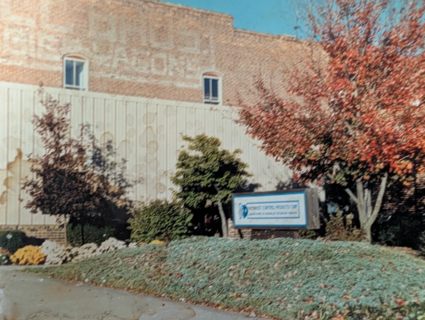 Archival photograph of the Midwest Control Products building and sign